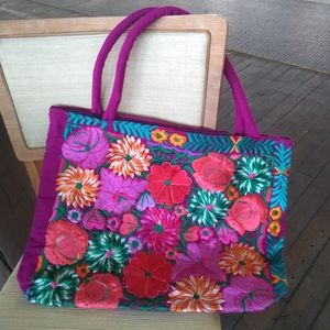 fuschia Mexican hand embroidered floral pattern bags
